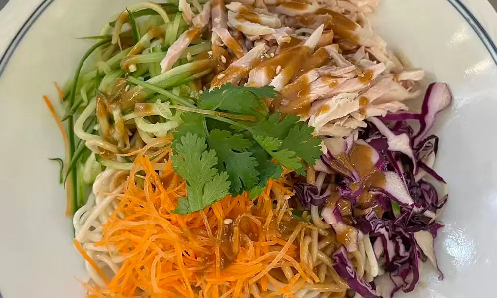 Chicken, veggies & noodles with mustard sauce at Licious Noodles & Bao, a Chinese Dumpling Restaurant in Rockledge